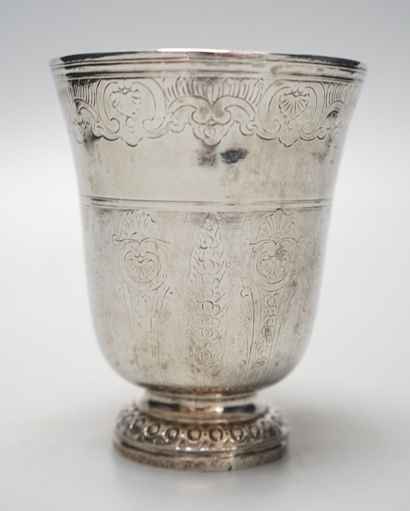 A 19th century French or Swiss engraved white metal beaker, 97mm, 90 grams.